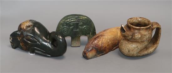 Four Chinese archaistic jade or hardstone zoomorphic carvings, largest, elephant head 17cm long